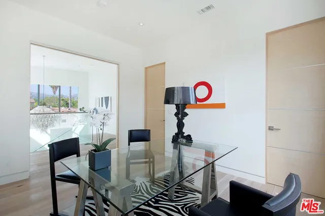 a view of kitchen and dining area with furniture