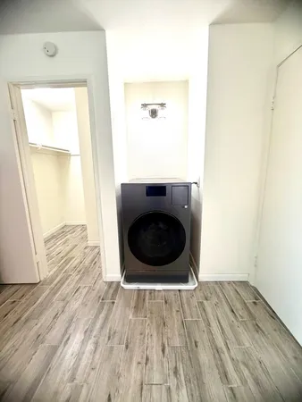 a bedroom with a bed and tv