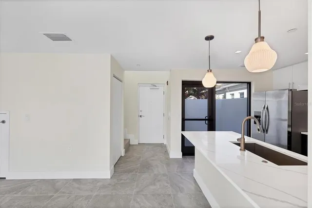 a view of a living room and bathroom