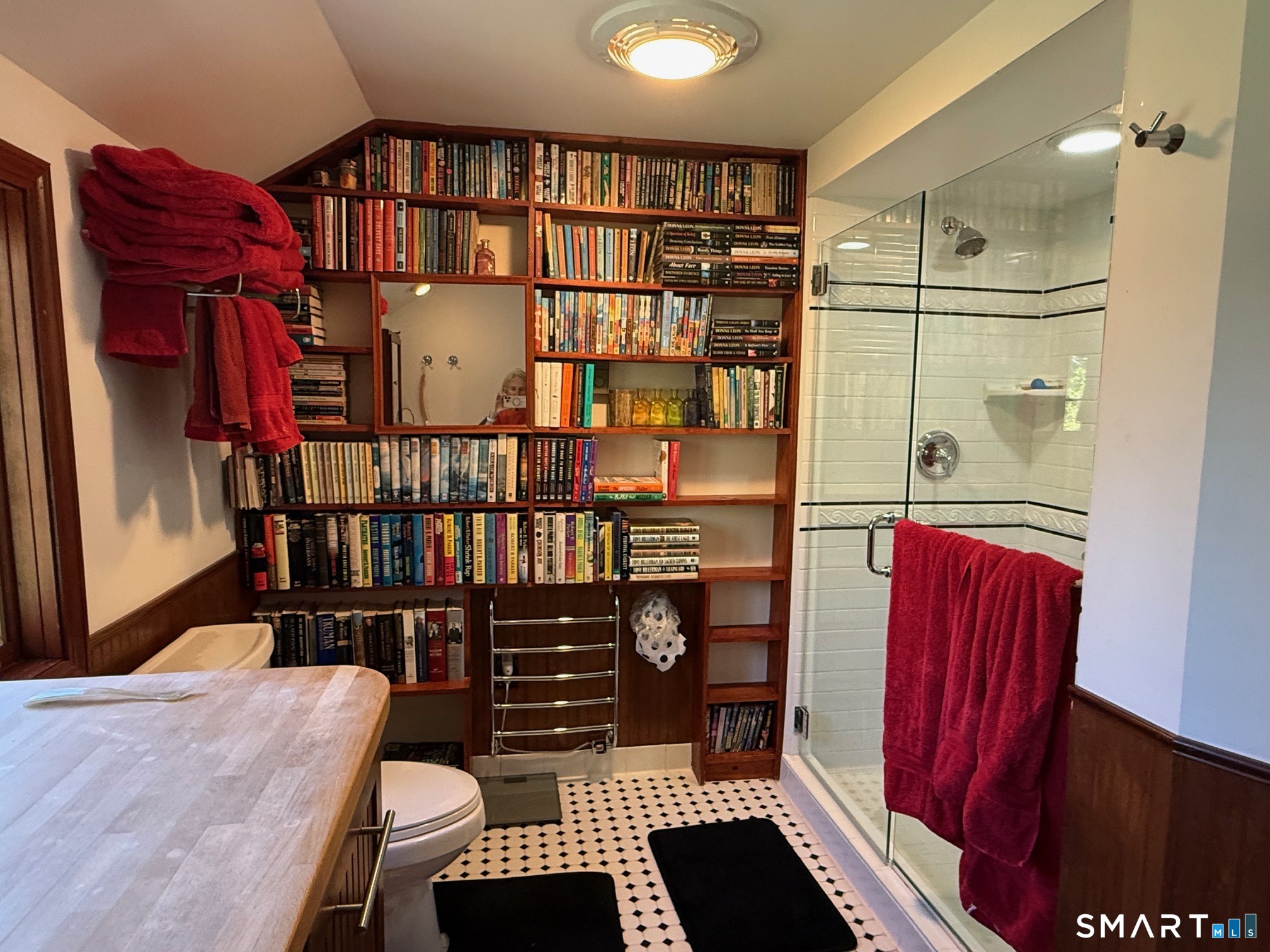 8 Ivy Road Stonington, CT 06355 - Photo 23 of 30 a view of walk in closet with clothes and shoes