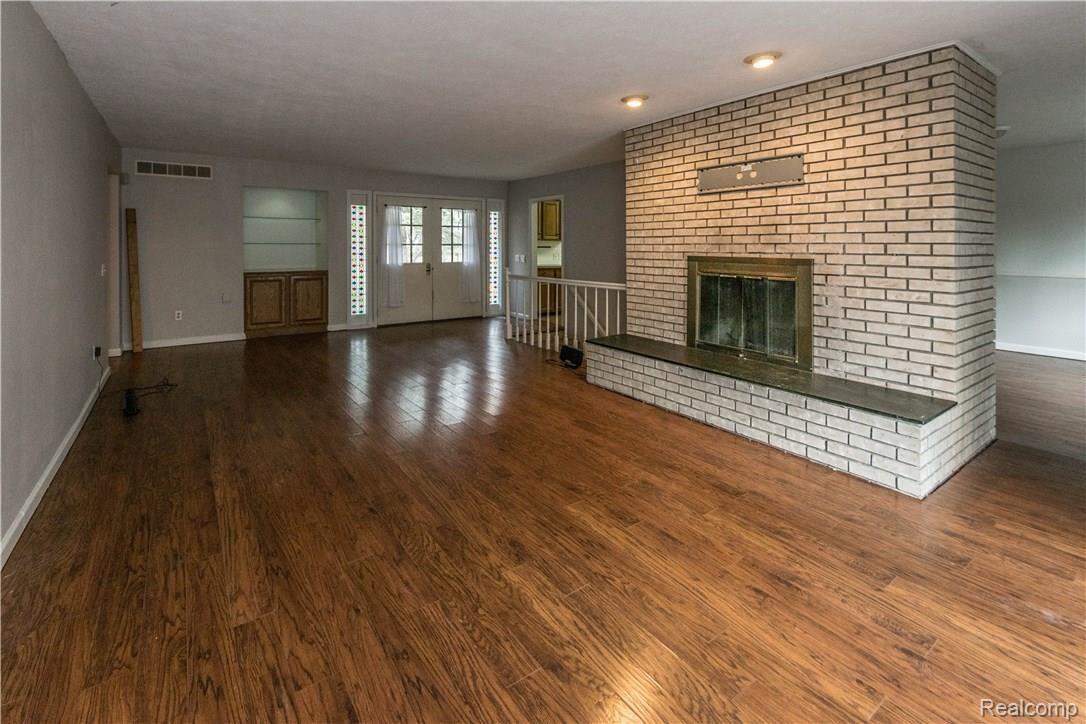 11180 Newman Road Brighton, MI 48114 - Photo 11 of 45 Living Room Fireplace.jpg