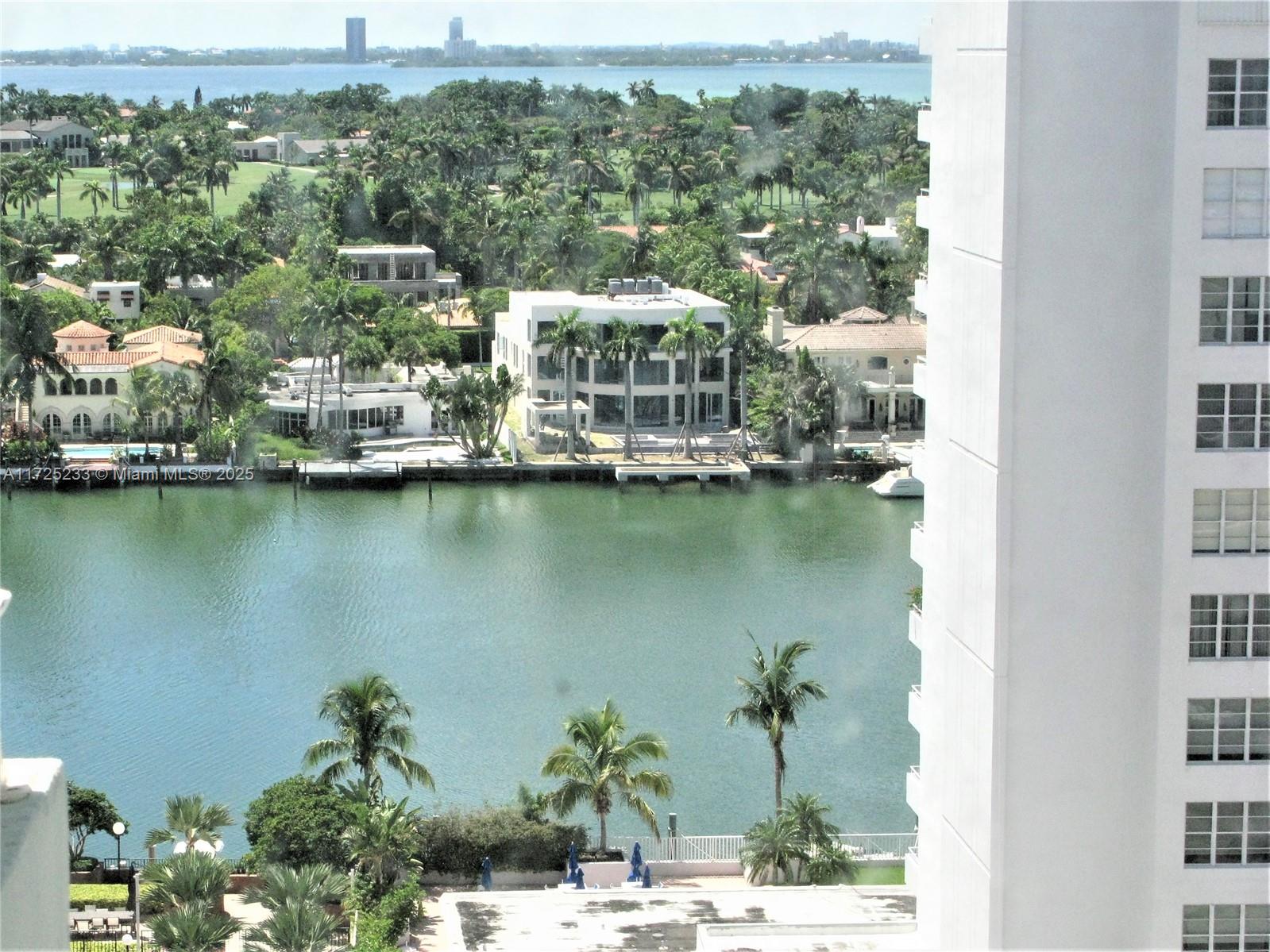 5701 Collins Avenue, Unit 1011 Miami Beach, FL 33140 - Photo 1 of 46 an aerial view of a house with a lake view