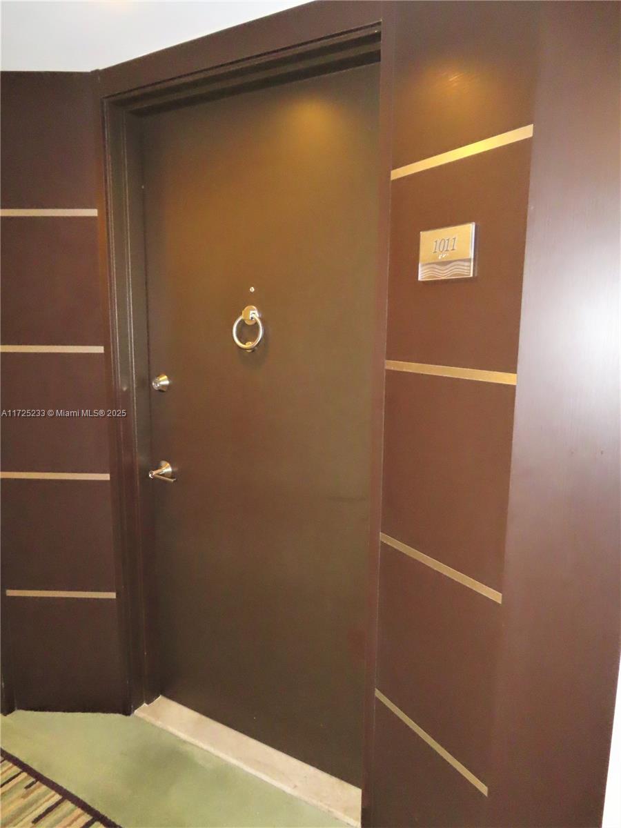 5701 Collins Avenue, Unit 1011 Miami Beach, FL 33140 - Photo 4 of 46 a bathroom with a shower