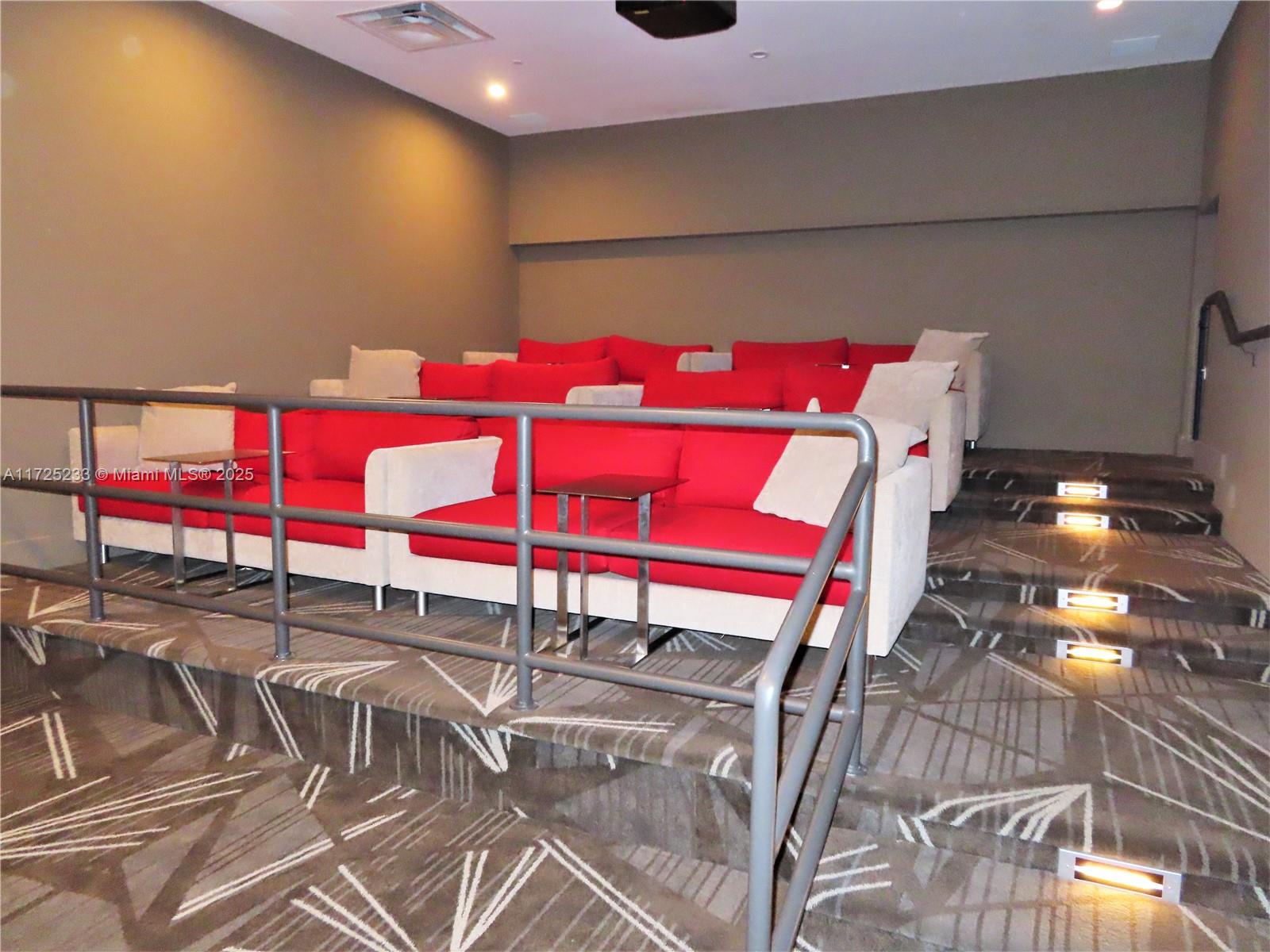 5701 Collins Avenue, Unit 1011 Miami Beach, FL 33140 - Photo 45 of 46 a view of a room with gym equipment