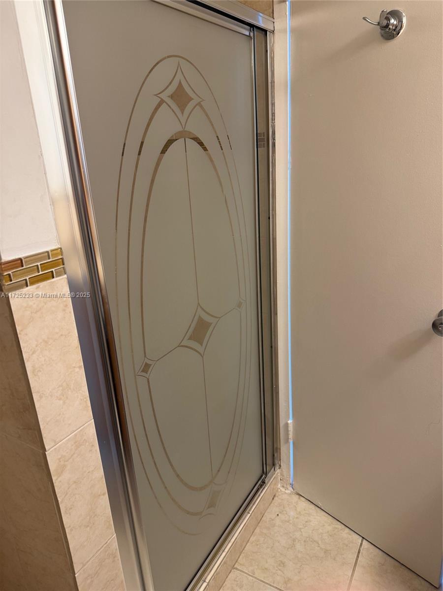 5701 Collins Avenue, Unit 1011 Miami Beach, FL 33140 - Photo 10 of 46 a view of walk in closet