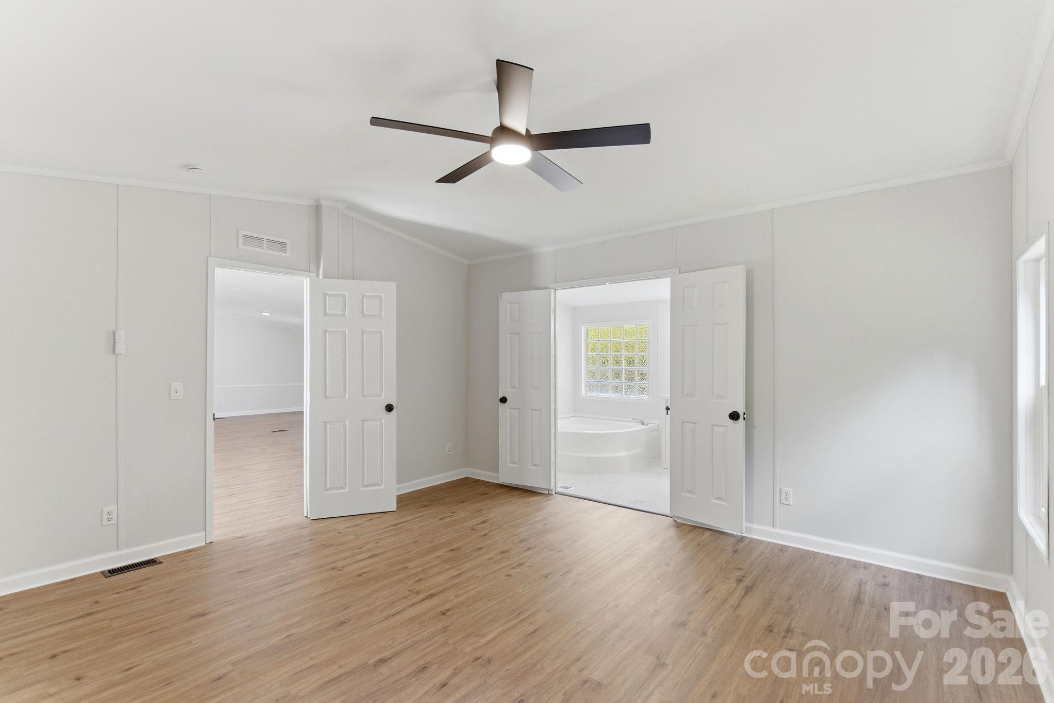 481 Harrell Road Burgaw, NC 28425 - Photo 12 of 25 a view of empty room with wooden floor