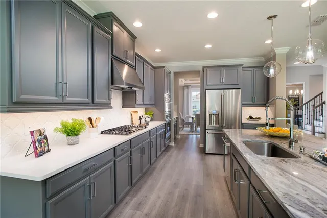 a bedroom with a bed mirror and a large window