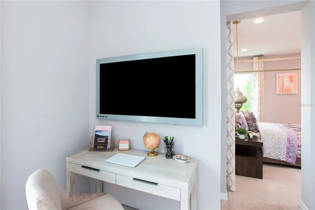 a view of a swimming pool with a yard