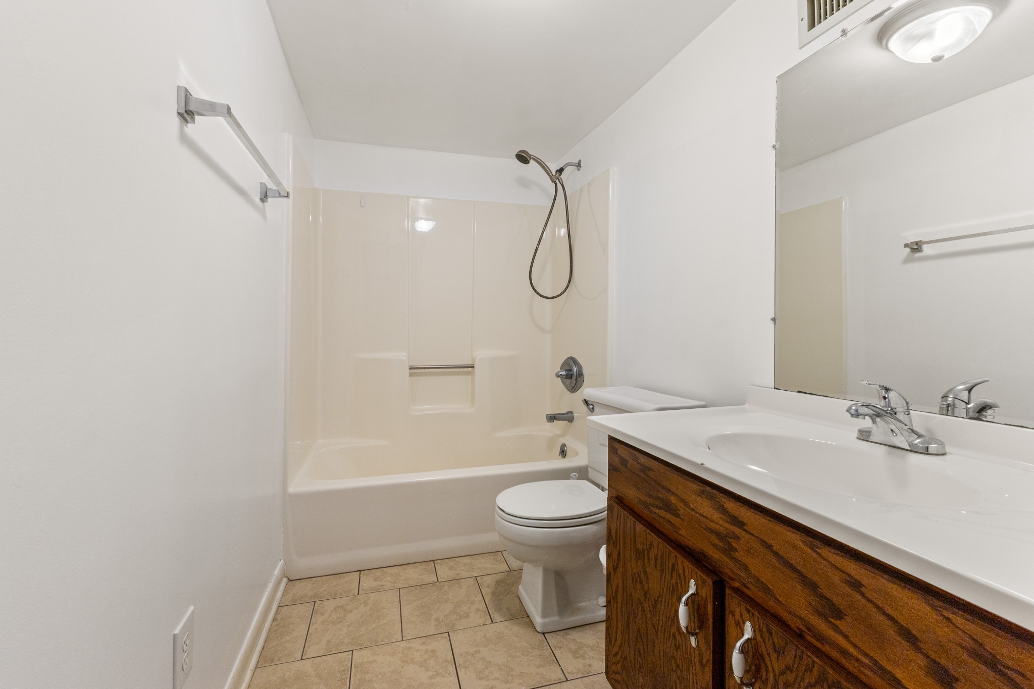 392 Feather Ridge Road Charlotte, TN 37036 - Photo 21 of 31 a bathroom with a sink a toilet and shower