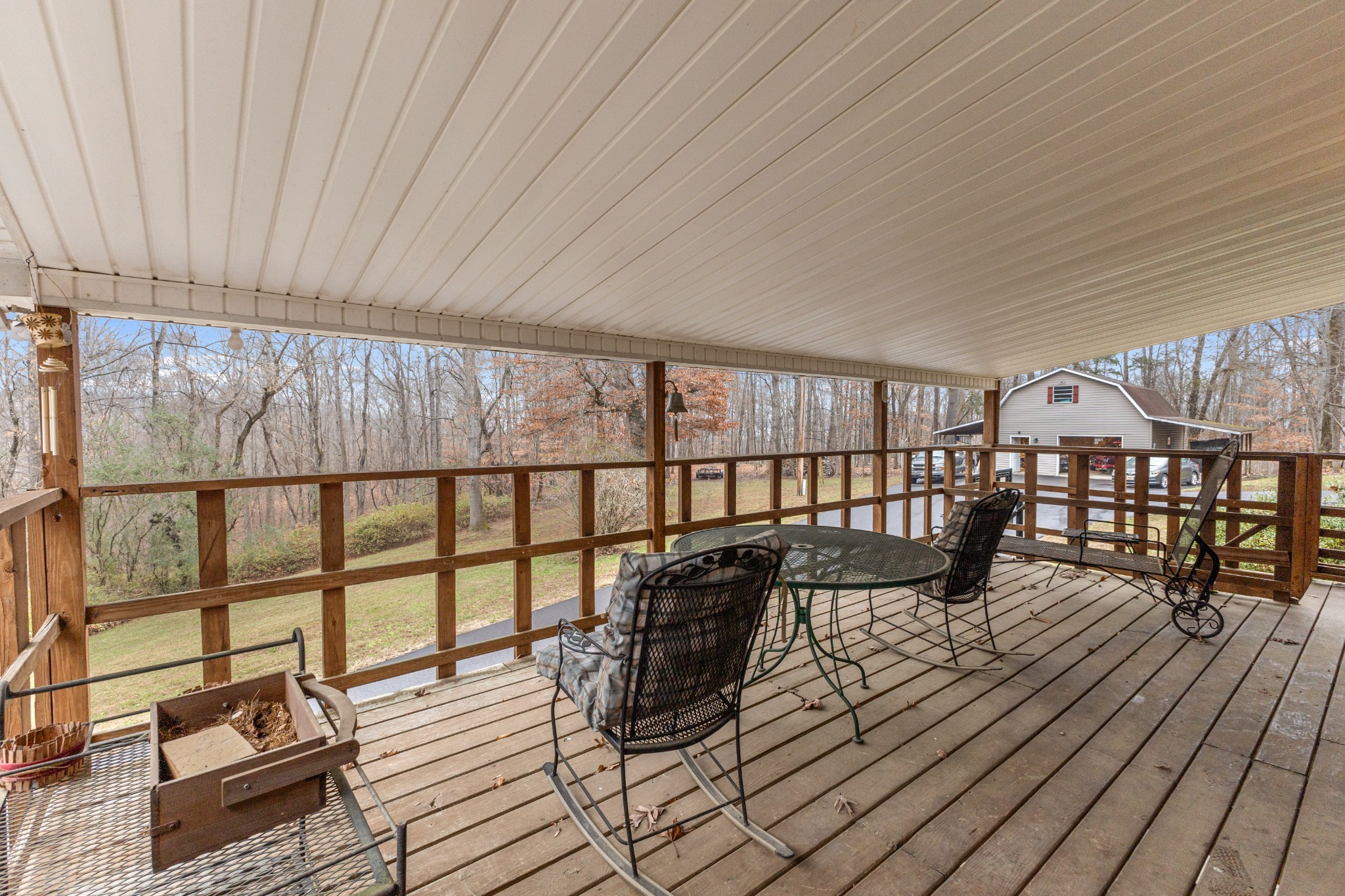 392 Feather Ridge Road Charlotte, TN 37036 - Photo 3 of 31 a view of a balcony with chairs