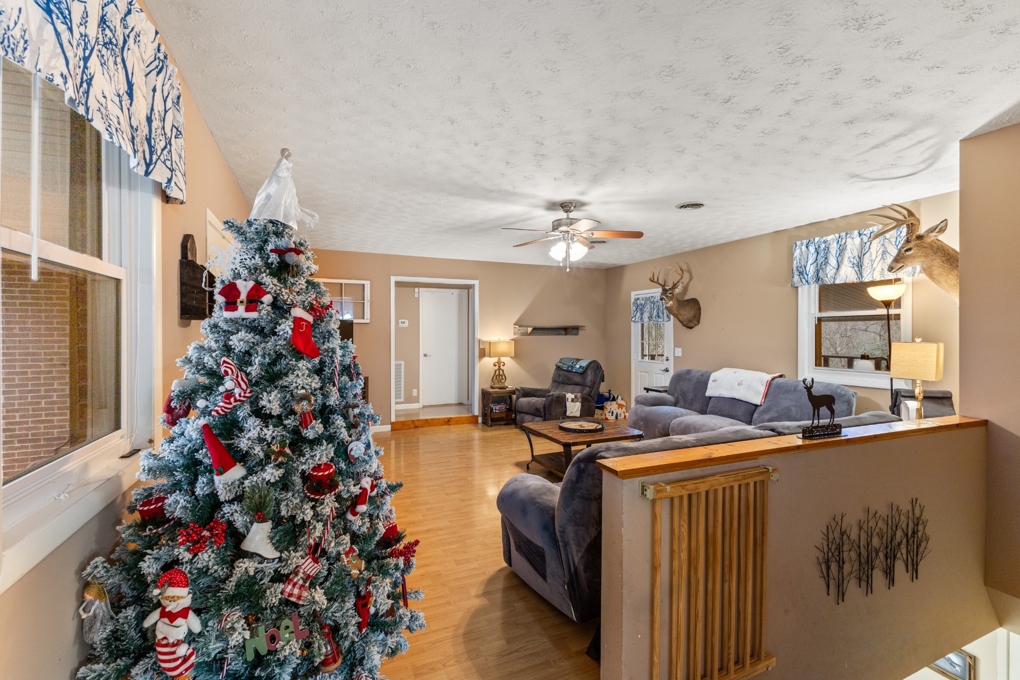 392 Feather Ridge Road Charlotte, TN 37036 - Photo 5 of 31 a view of a dining room with furniture and a chandelier