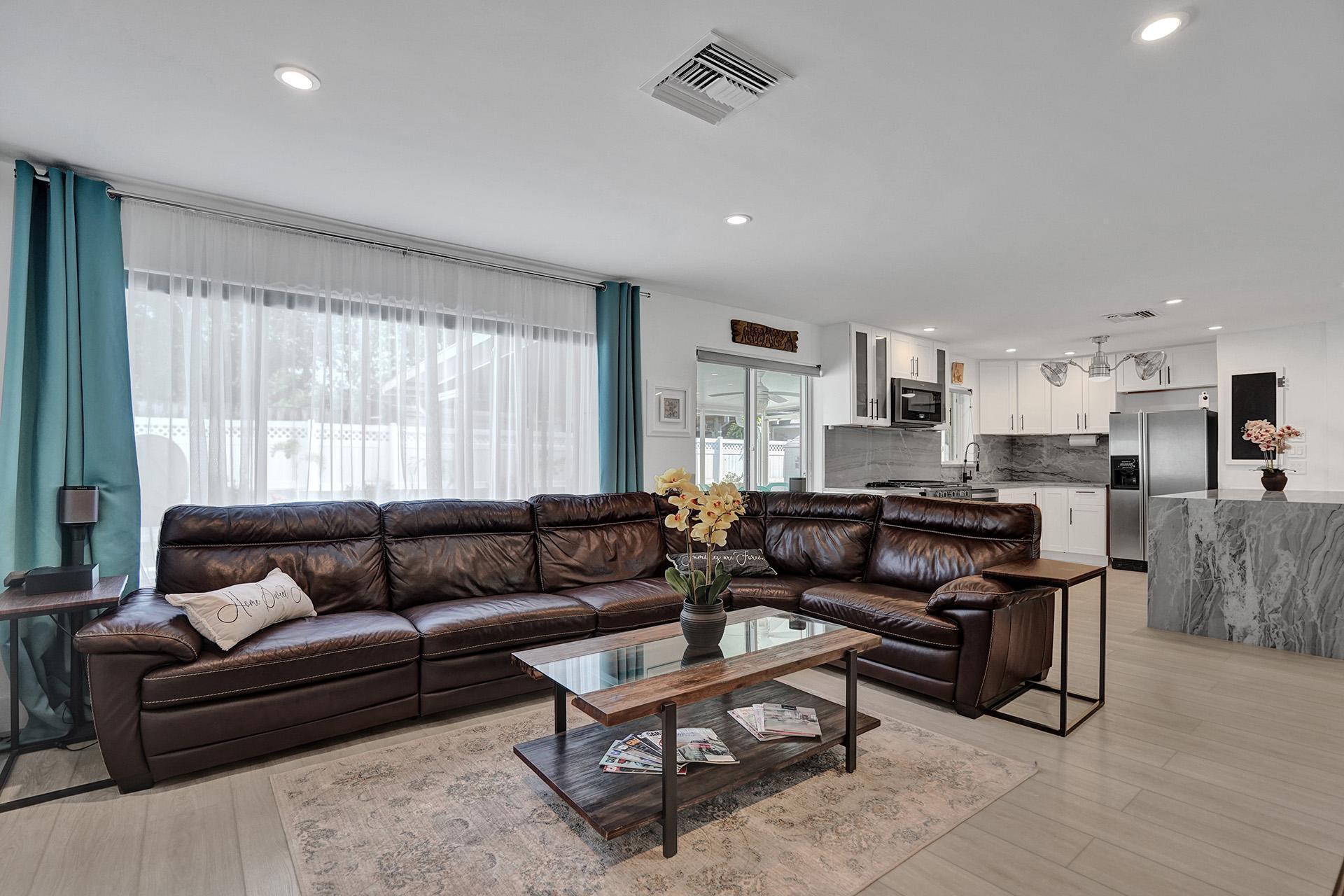 2425 Southeast 6th Street Pompano Beach, FL 33062 - Photo 11 of 18 a living room with furniture and a large window