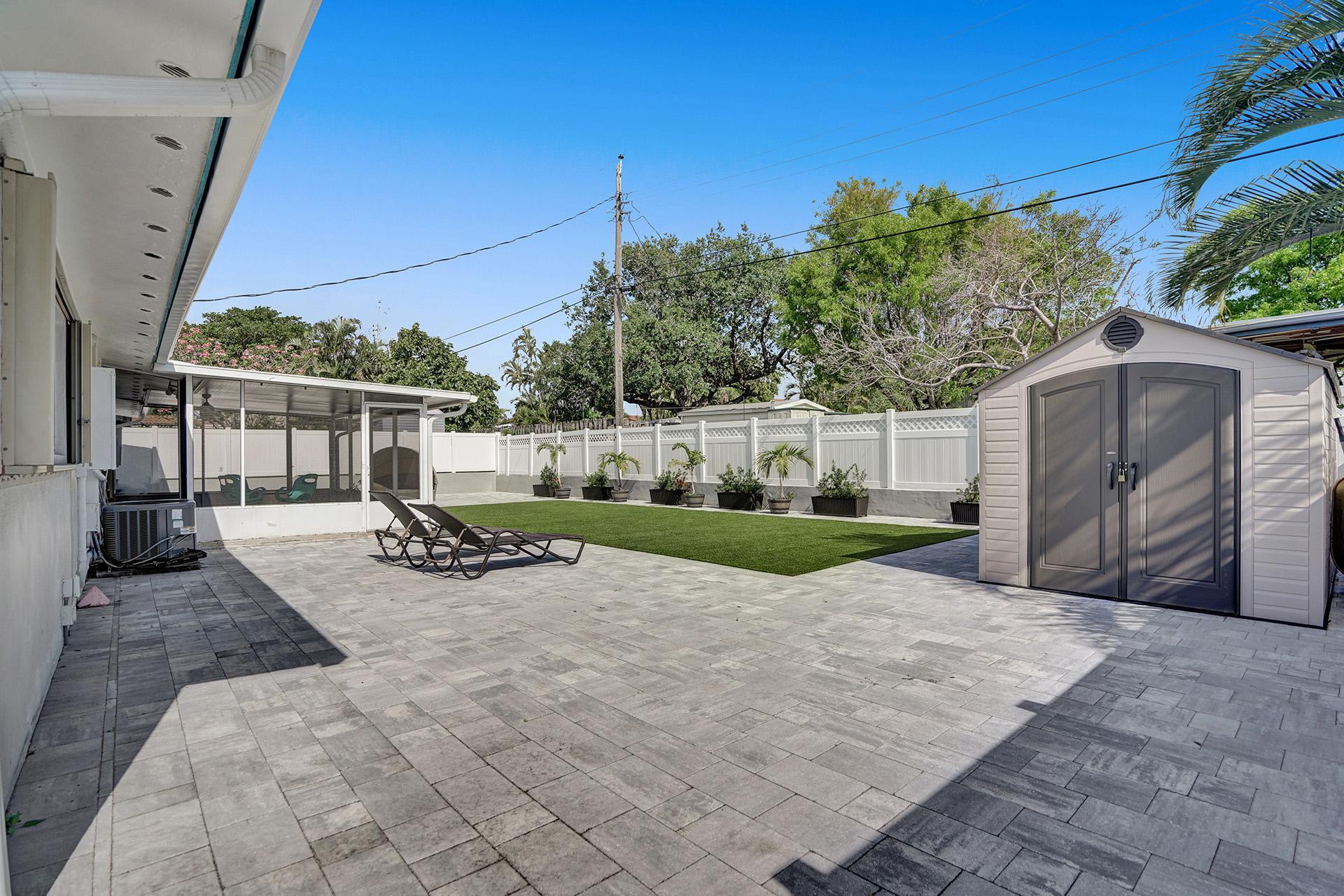 2425 Southeast 6th Street Pompano Beach, FL 33062 - Photo 17 of 18 a view of a house with backyard and sitting area