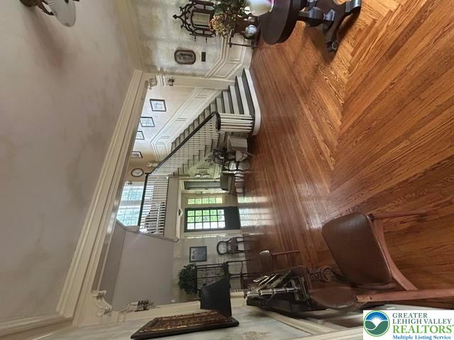 1170 Mosser Road Breinigsville, PA 18031 - Photo 19 of 19 Grand hardwood flooring flows through this stately entry, leading to a majestic staircase.