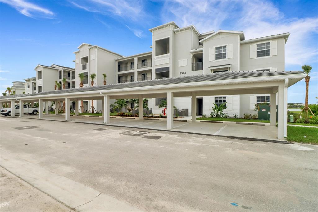 5651 Double Eagle Circle, Unit 4324 Immokalee, FL 34142 - Photo 25 of 25 a front view of building with street