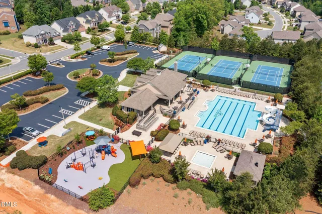 an aerial view of a house with a garden