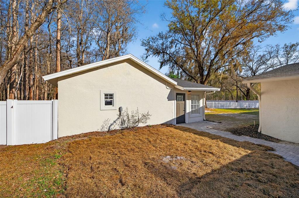 1120 Country Lane Lutz, FL 33558 - Photo 40 of 52 a view of a house with backyard
