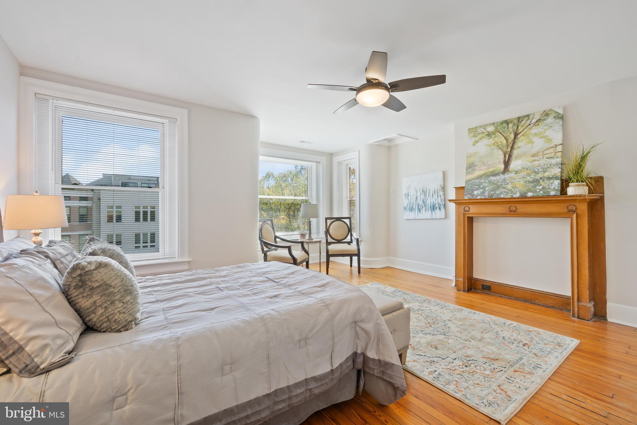 2724 13th Street Northwest Washington, DC 20009 - Photo 17 of 49 a bedroom with a bed and a dresser with mirror