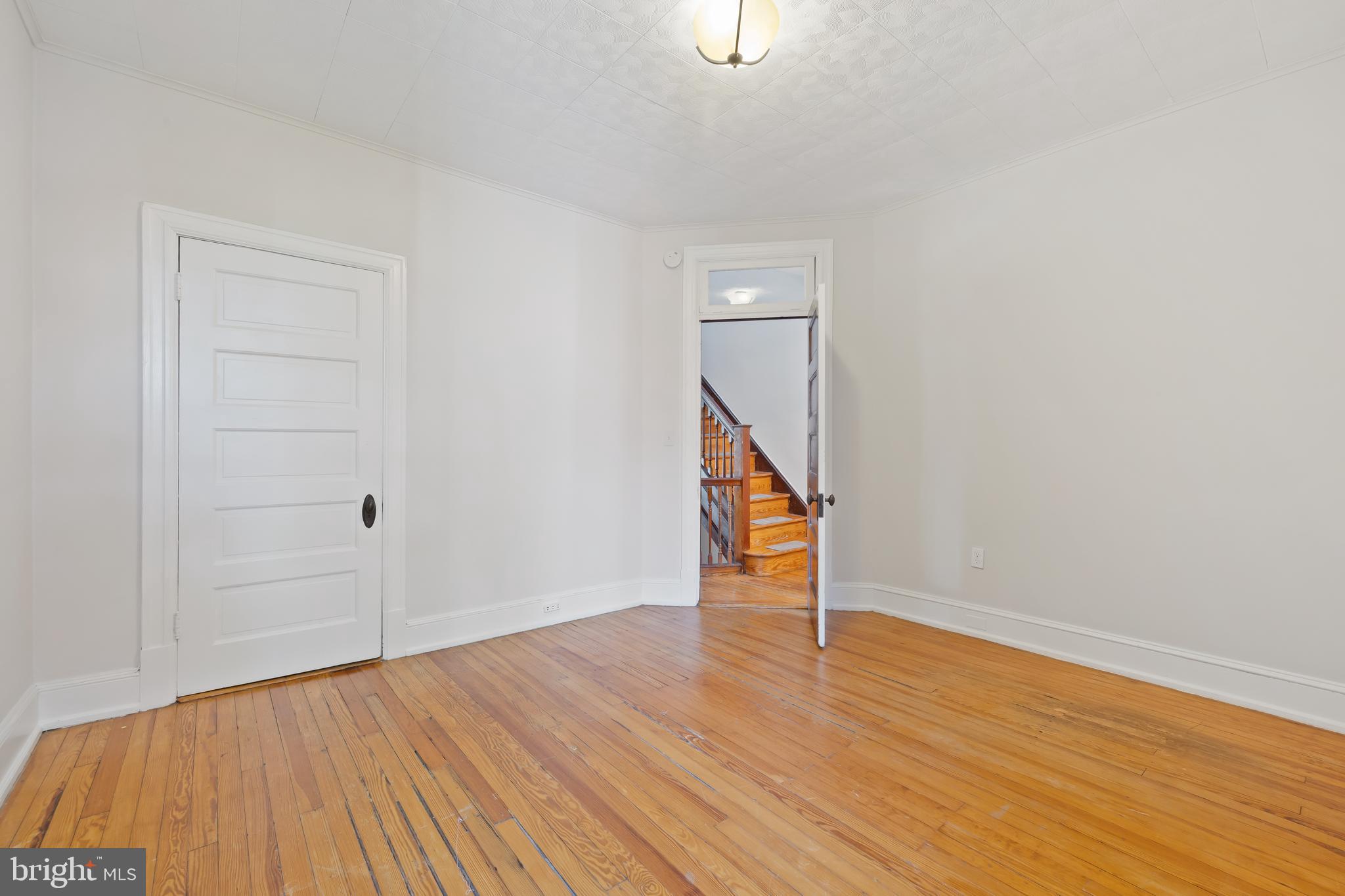 2724 13th Street Northwest Washington, DC 20009 - Photo 27 of 49 wooden floor in an empty room