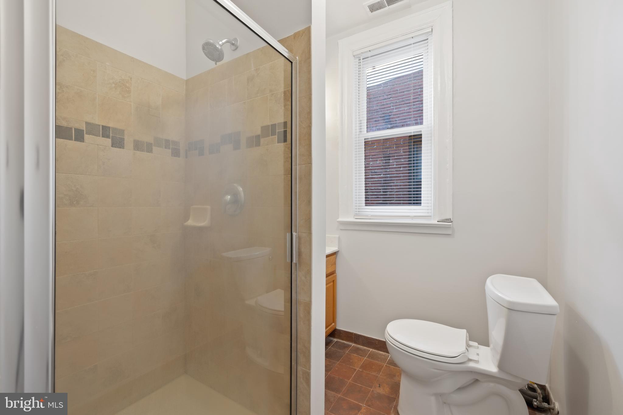 2724 13th Street Northwest Washington, DC 20009 - Photo 28 of 49 a bathroom with a toilet and a shower