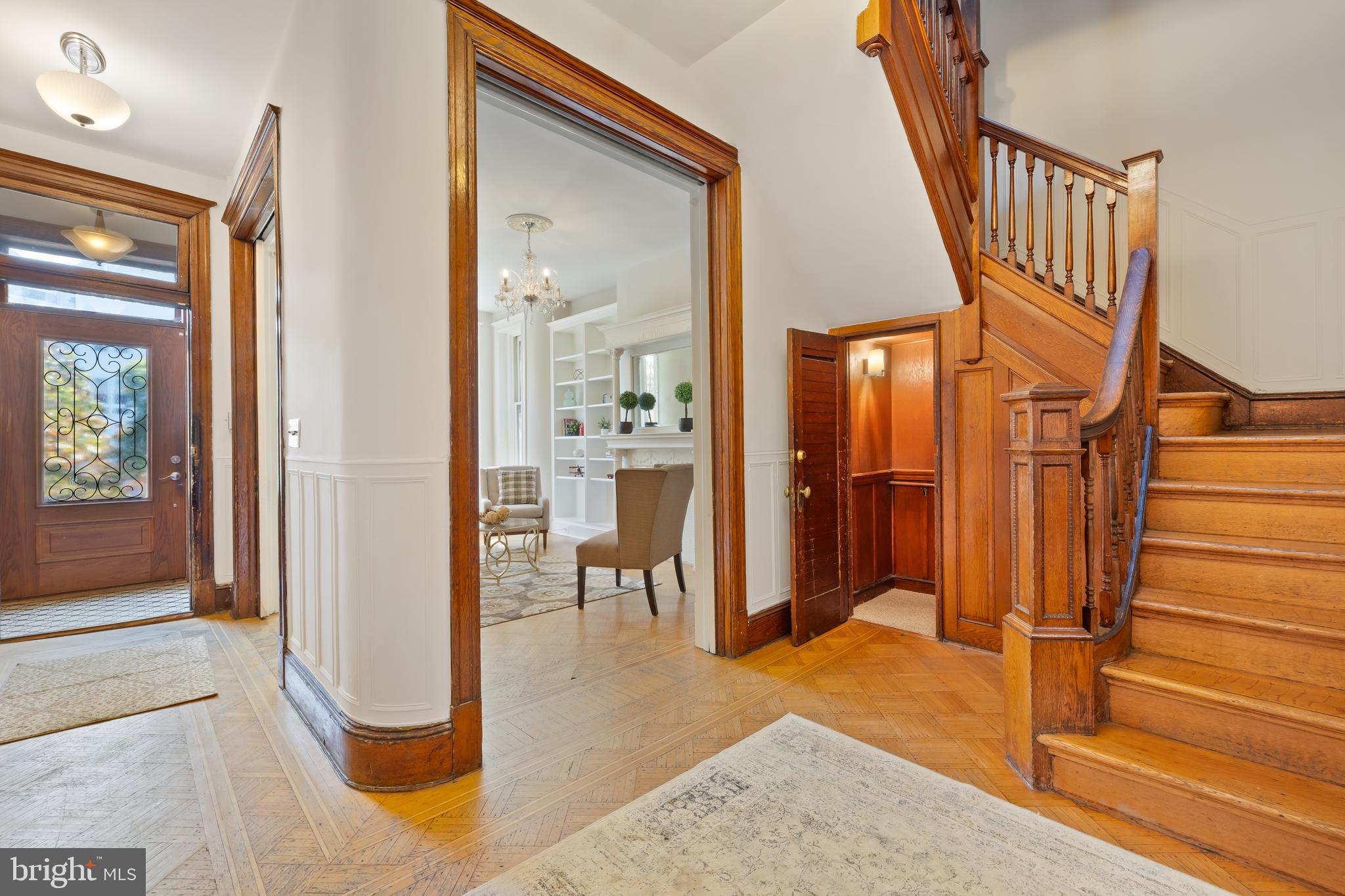 2724 13th Street Northwest Washington, DC 20009 - Photo 37 of 49 a view of a hallway with wooden floor and staircase