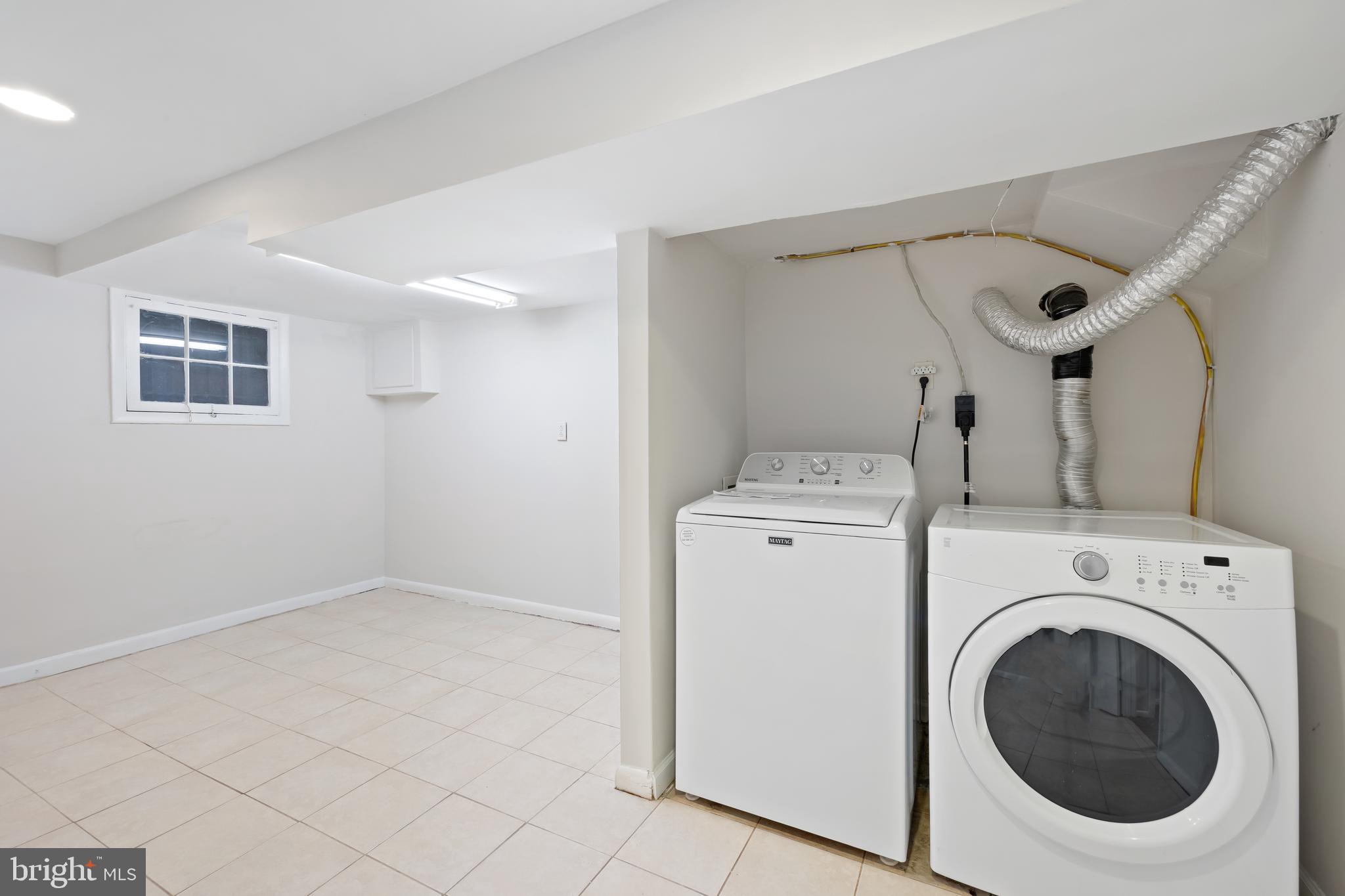 2724 13th Street Northwest Washington, DC 20009 - Photo 45 of 49 a view of storage and utility room with washer and dryer