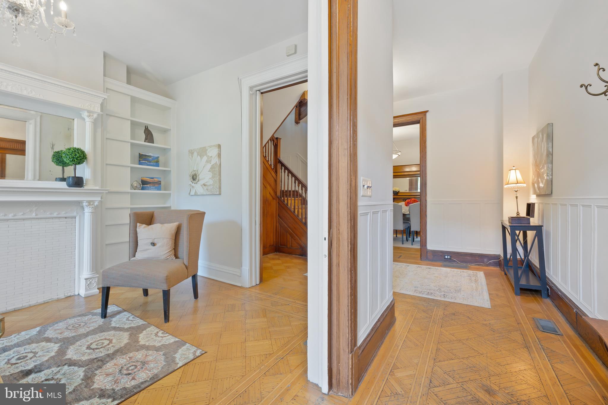 2724 13th Street Northwest Washington, DC 20009 - Photo 6 of 49 a view of a hallway to a livingroom and a chair