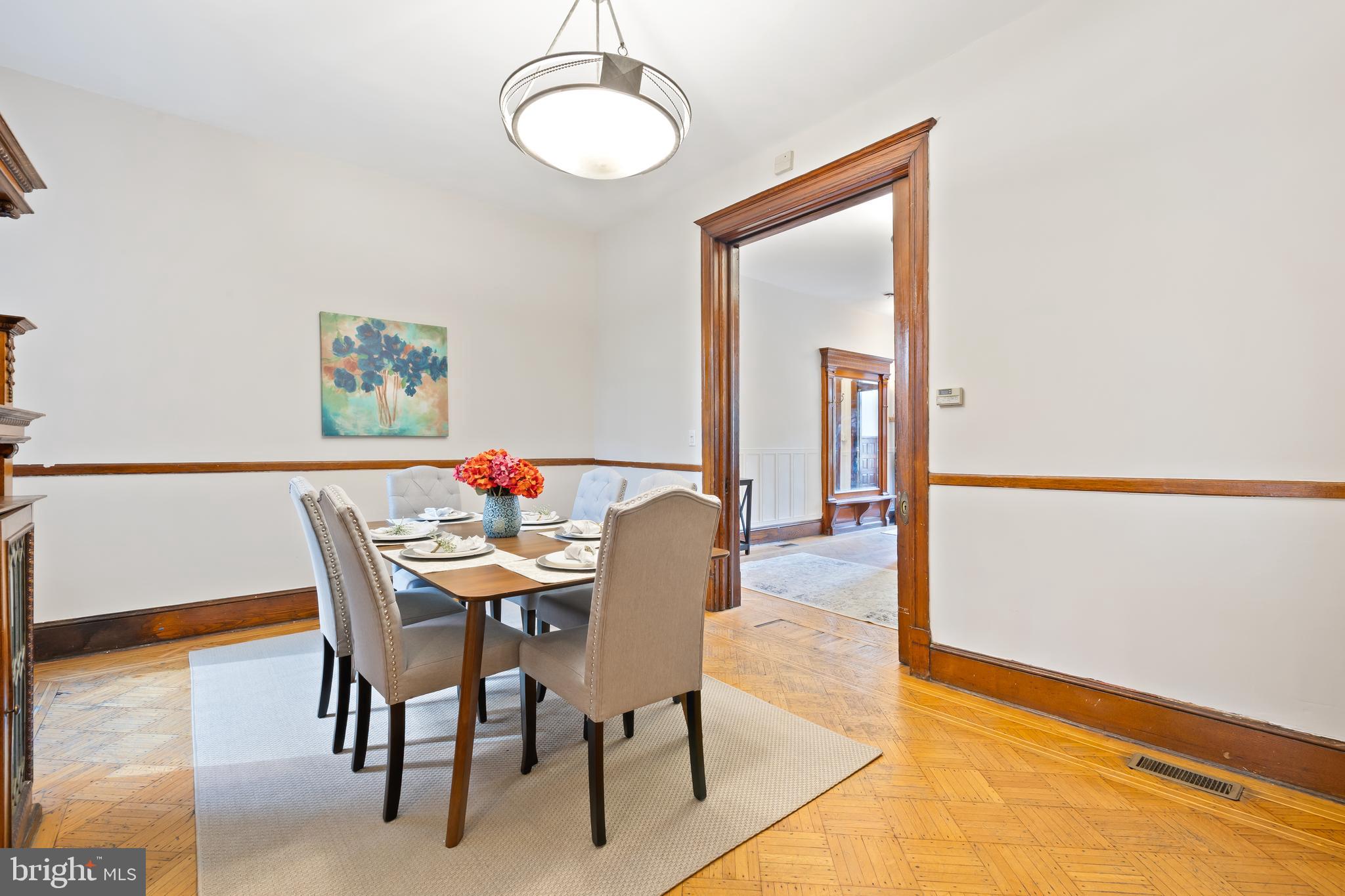 2724 13th Street Northwest Washington, DC 20009 - Photo 8 of 49 a dining room with furniture and wooden floor