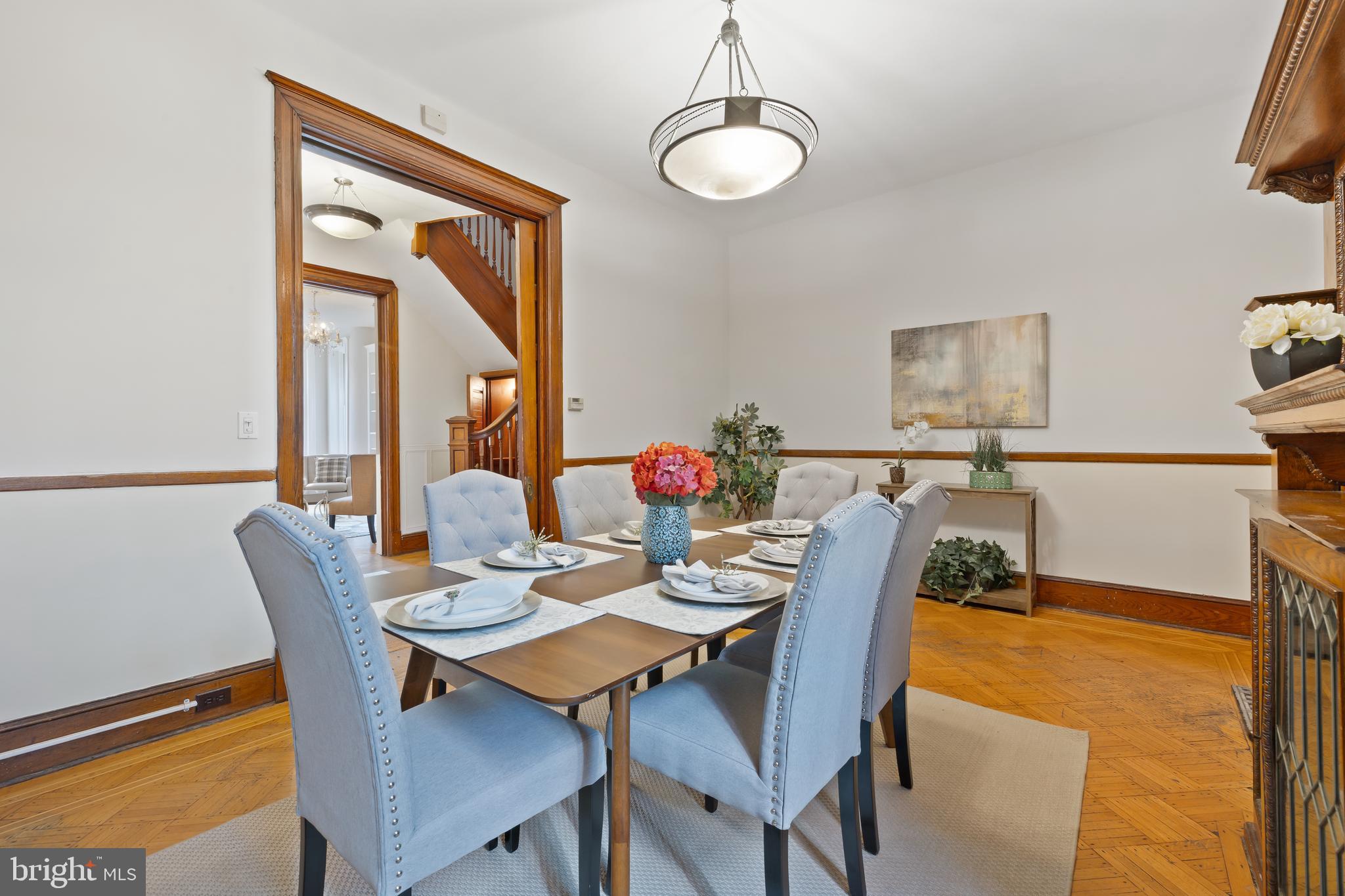 2724 13th Street Northwest Washington, DC 20009 - Photo 9 of 49 a view of a dining room with furniture and a potted plant