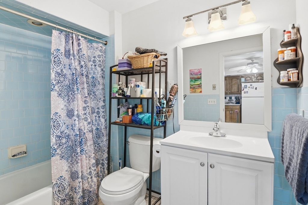 21 Whitman Street Leominster, MA 01453 - Photo 25 of 34 a bathroom with a sink toilet and shower