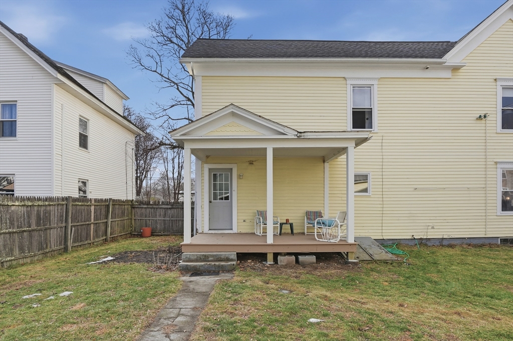 21 Whitman Street Leominster, MA 01453 - Photo 32 of 34 a view of a house with backyard porch and furniture