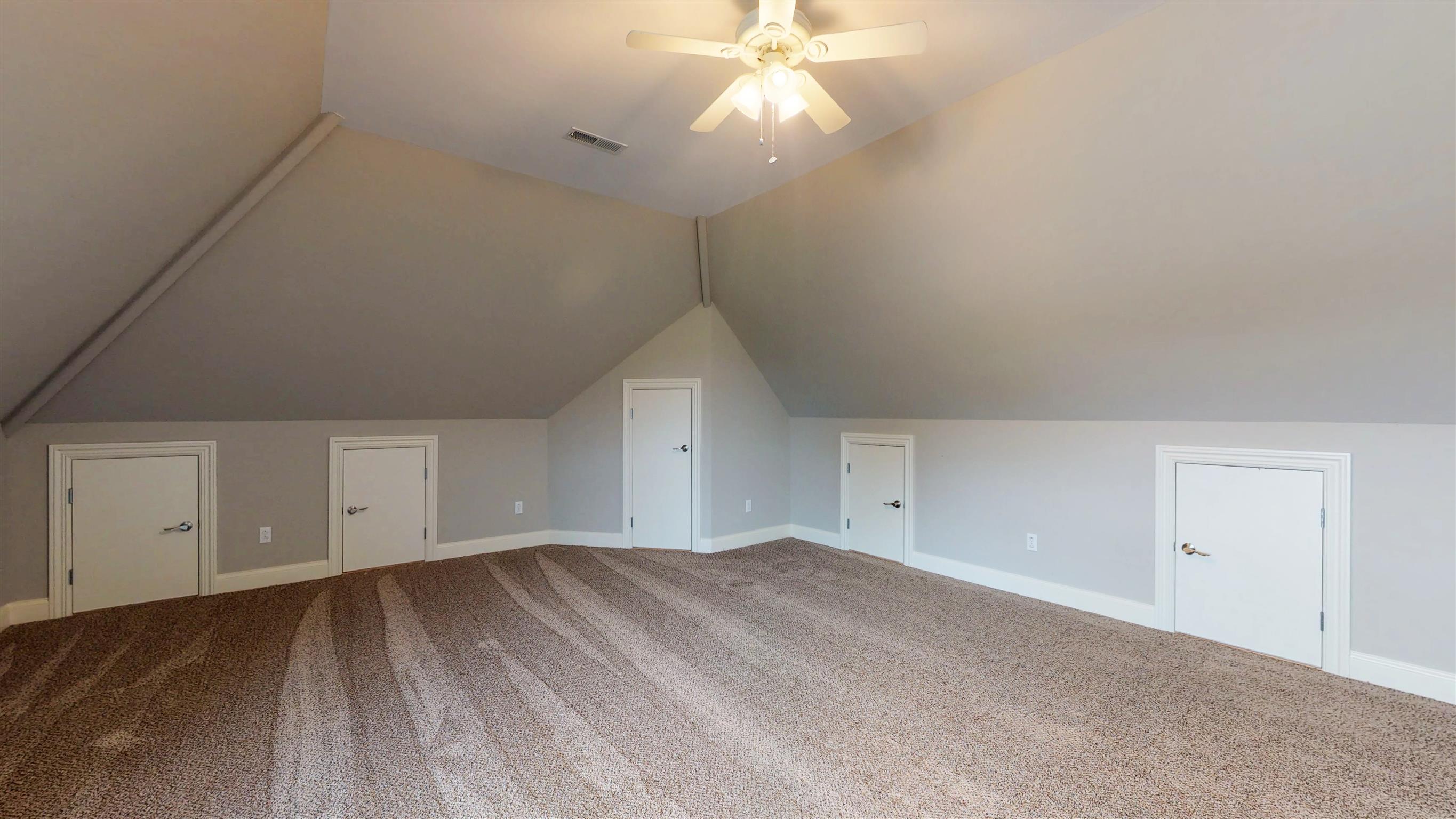 490 Gregory Road Westmoreland, TN 37186 - Photo 22 of 30 Bomuns room has amazing storage, a play nook for the little ones, and and full attached bath. This could easily be used as a bedroom suite.