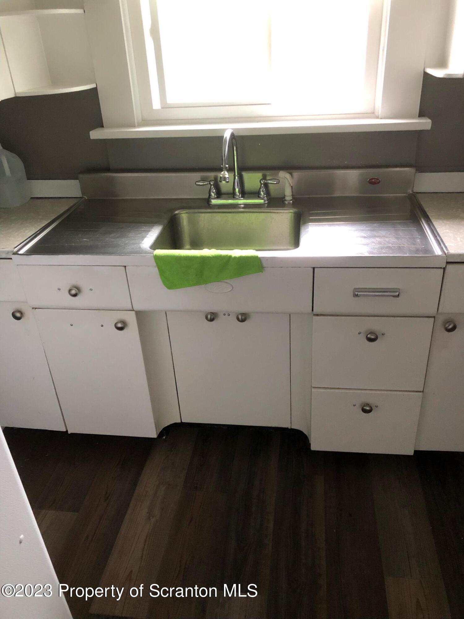 1111 Church Street Jessup, PA 18434 - Photo 5 of 10 a close view of sink and cabinets
