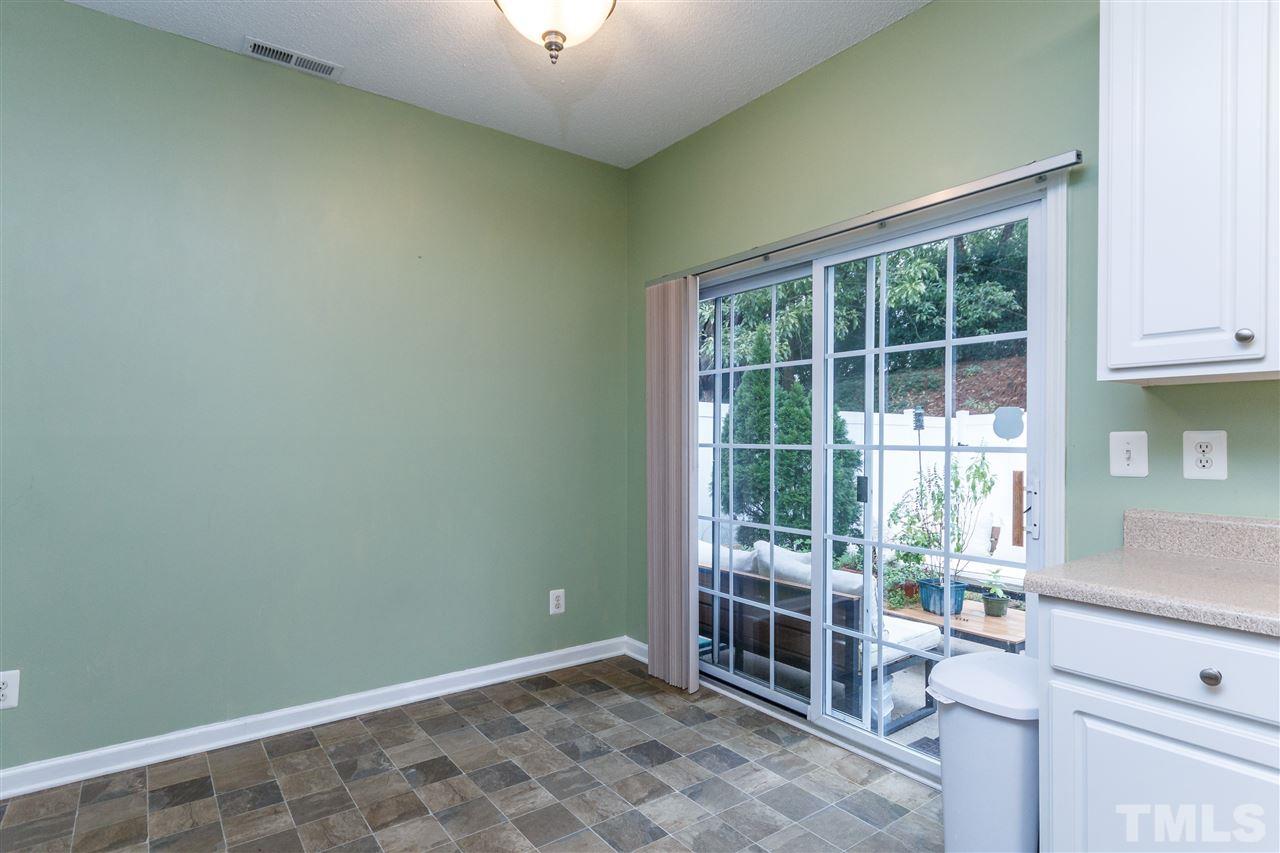 1035 Lake Moraine Place Raleigh, NC 27607 - Photo 8 of 19 an empty room with windows
