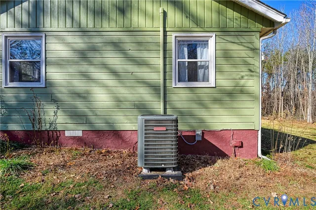a view of a wooden door and a yard
