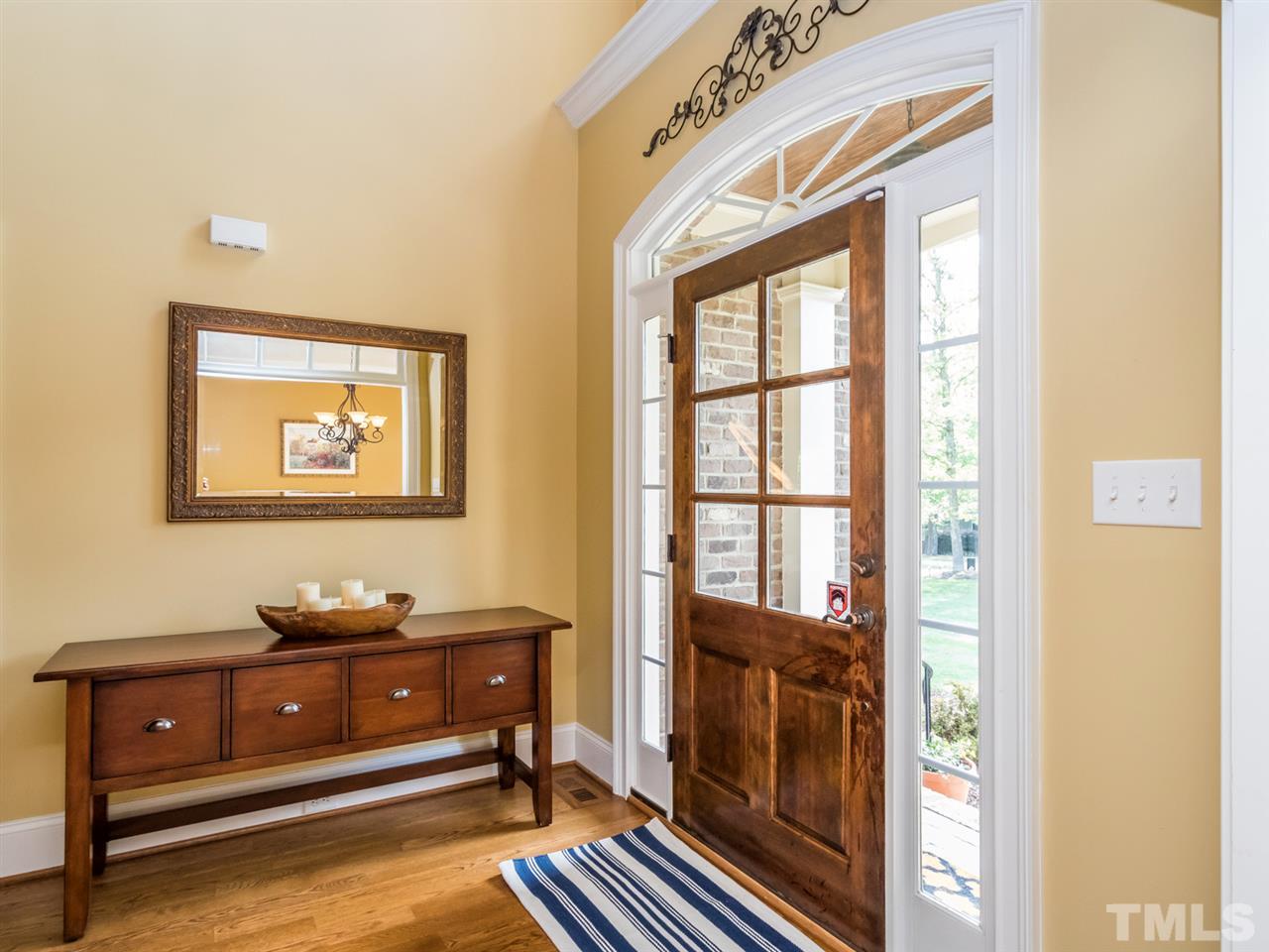 3424 Griffice Mill Road Raleigh, NC 27610 - Photo 2 of 25 a room with a bed and a window