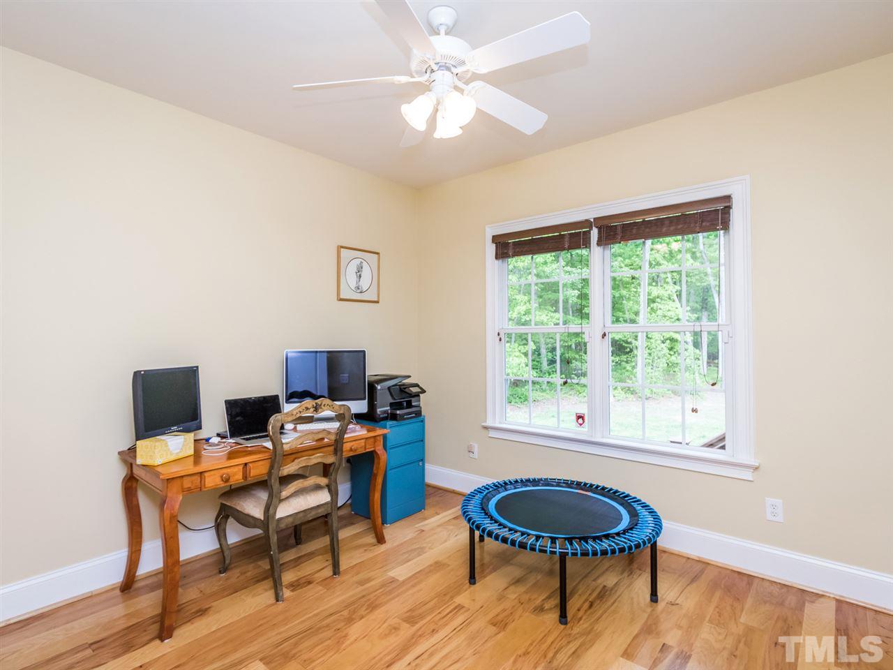 3424 Griffice Mill Road Raleigh, NC 27610 - Photo 15 of 25 a work room with furniture and a window
