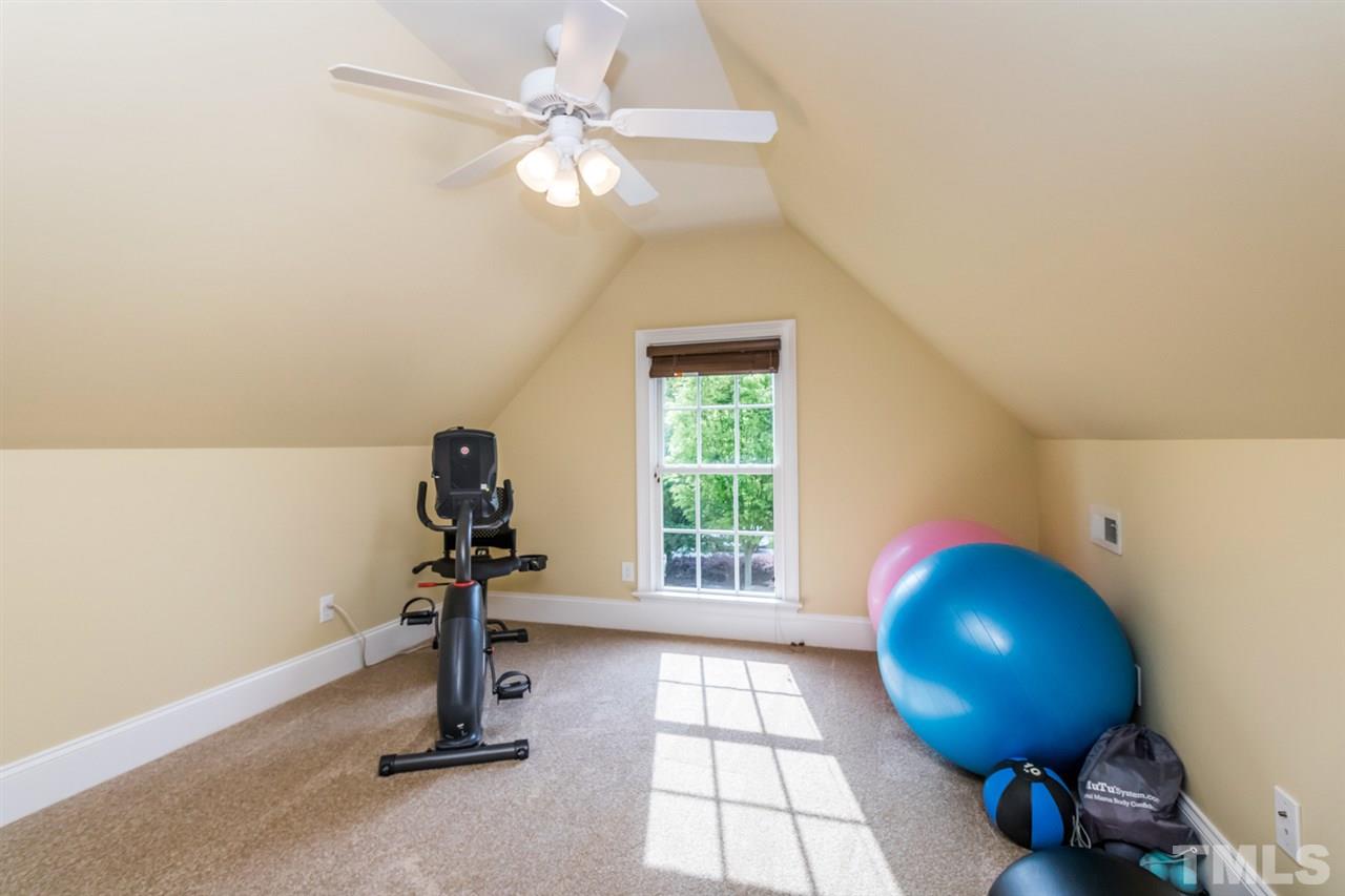 3424 Griffice Mill Road Raleigh, NC 27610 - Photo 20 of 25 a view of a room with gym equipment