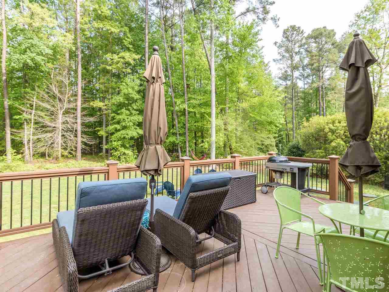 3424 Griffice Mill Road Raleigh, NC 27610 - Photo 21 of 25 a view of a chair and tables in the balcony