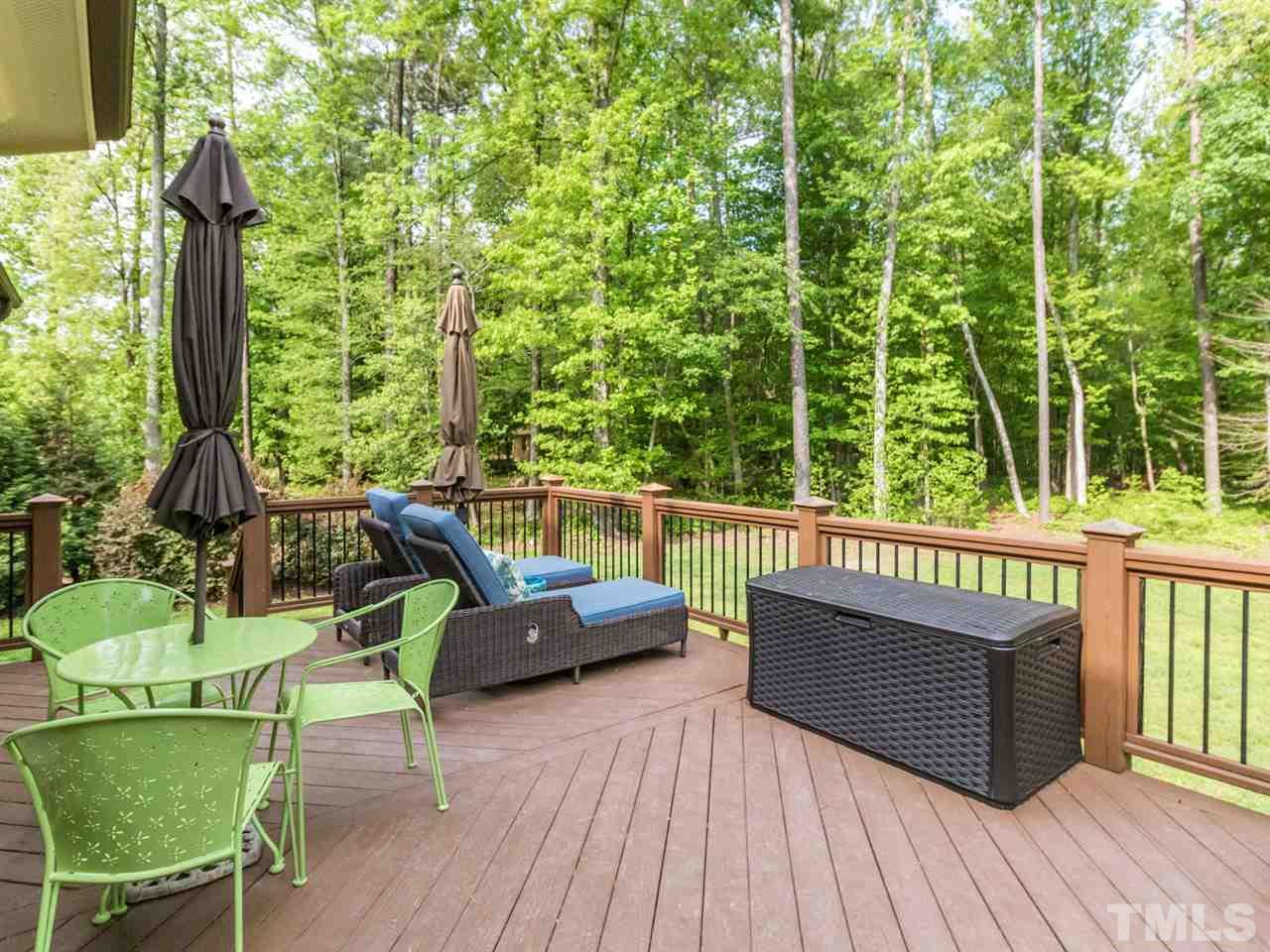 3424 Griffice Mill Road Raleigh, NC 27610 - Photo 22 of 25 a view of a chair and tables the patio