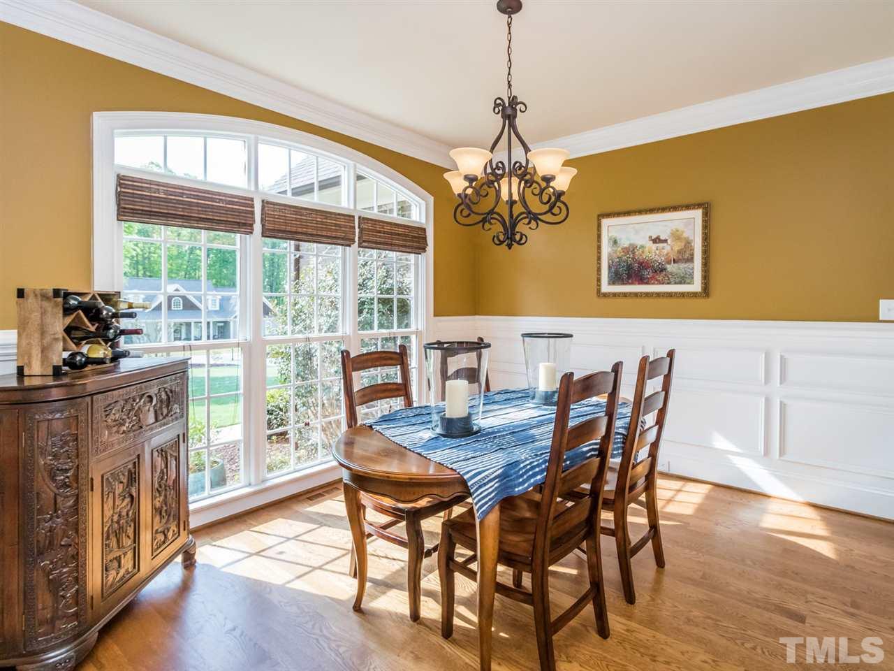 3424 Griffice Mill Road Raleigh, NC 27610 - Photo 6 of 25 a view of a dining room with furniture window and wooden floor