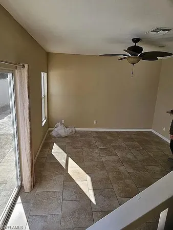 an empty room with a bench