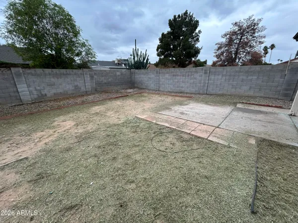 a view of a pathway with a house