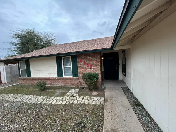 a view of a house with a patio