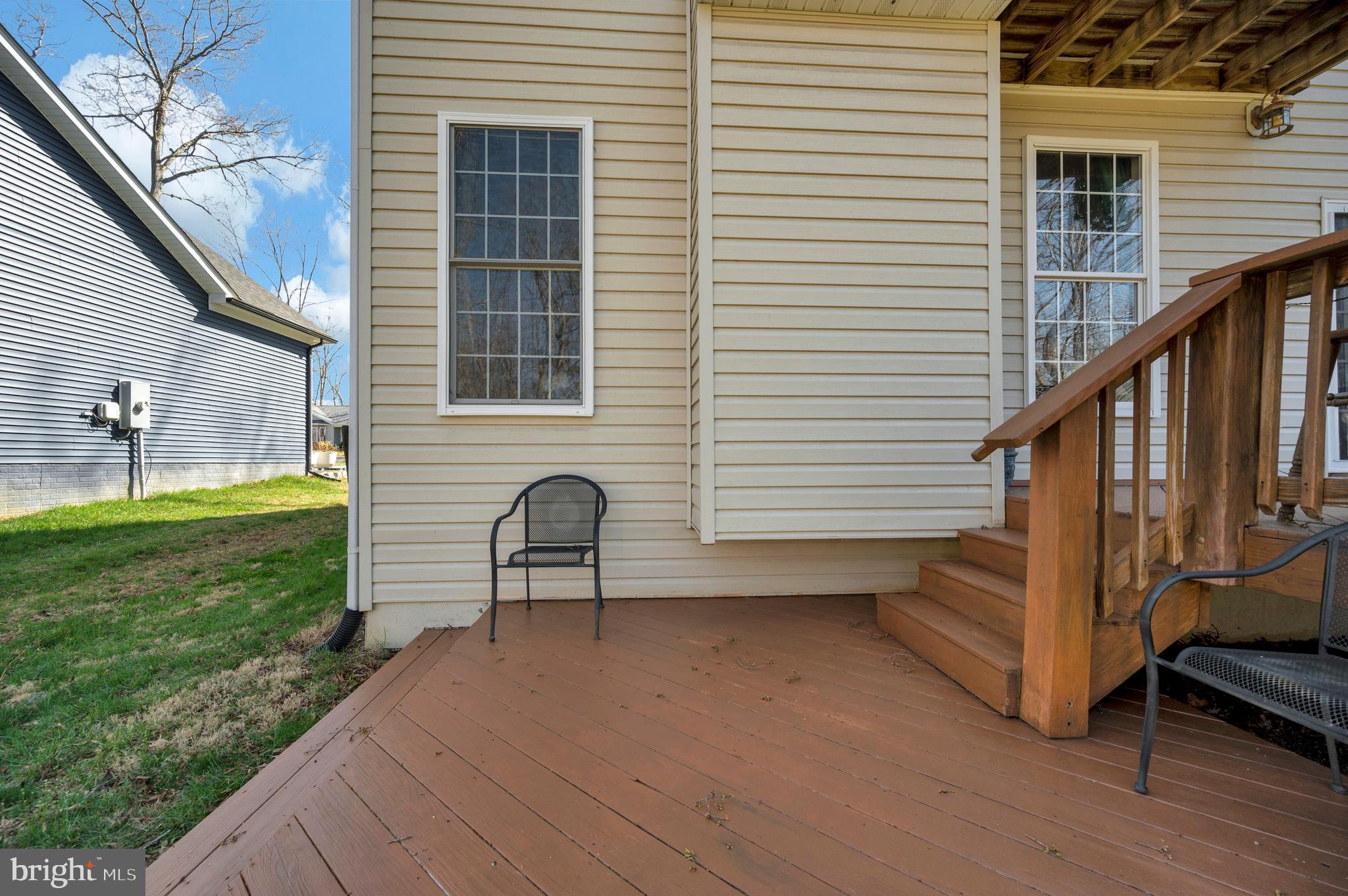 408 Liberty Boulevard Locust Grove, VA 22508 - Photo 29 of 45 a view of a house with backyard and deck