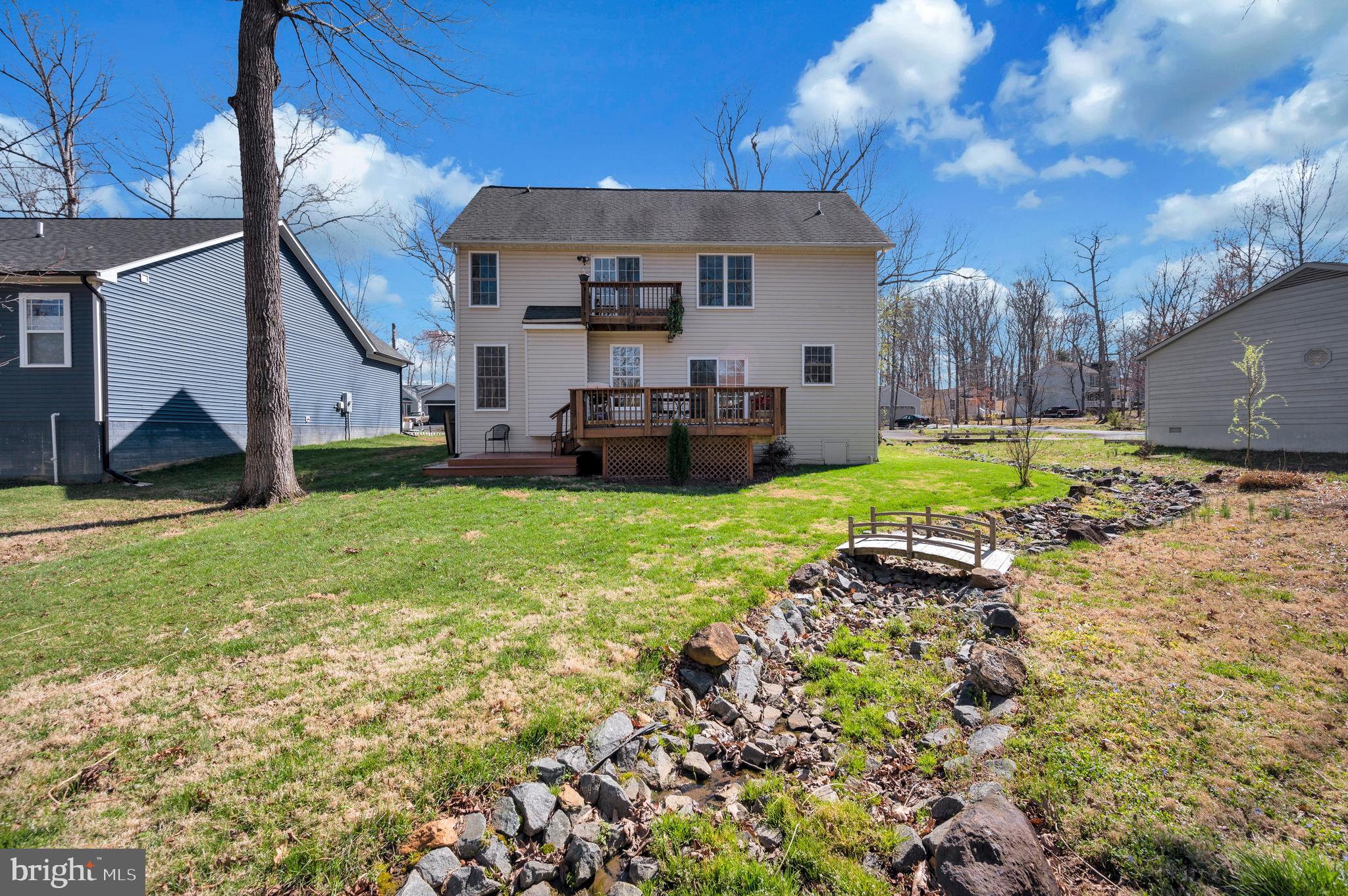 408 Liberty Boulevard Locust Grove, VA 22508 - Photo 33 of 45 a view of a house with backyard and sitting area