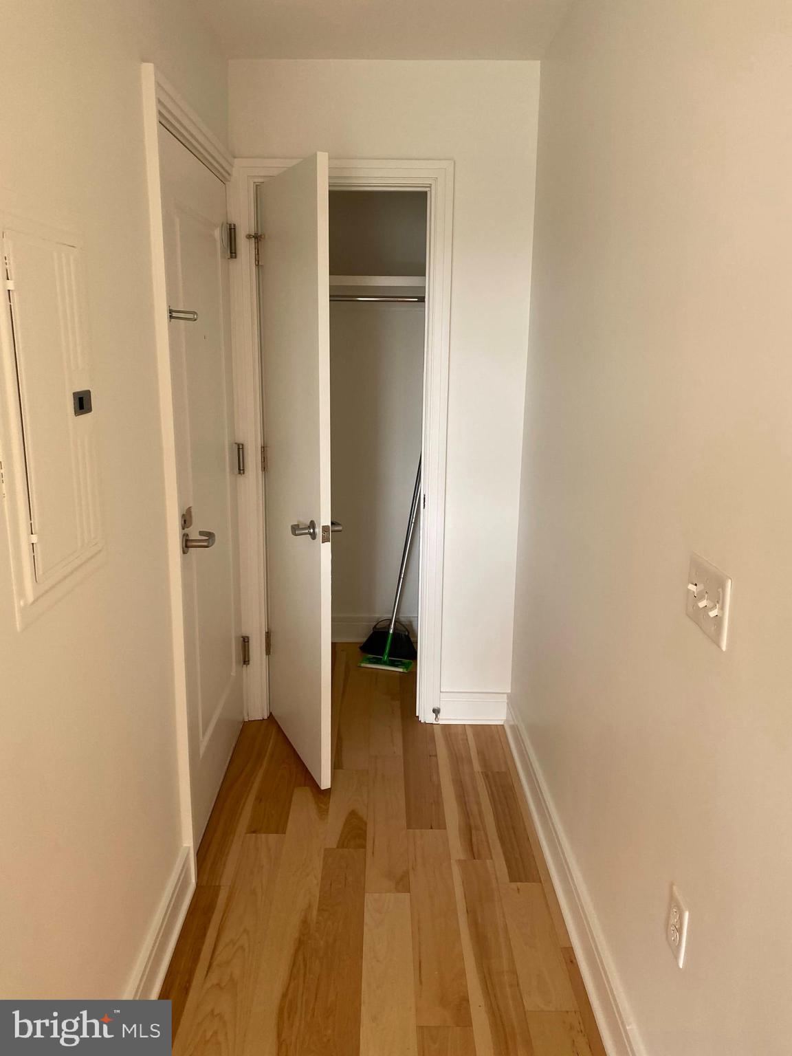 800 4th Street Southwest, Unit S621 Washington, DC 20024 - Photo 2 of 15 a view of a room with wooden floor and a bathroom