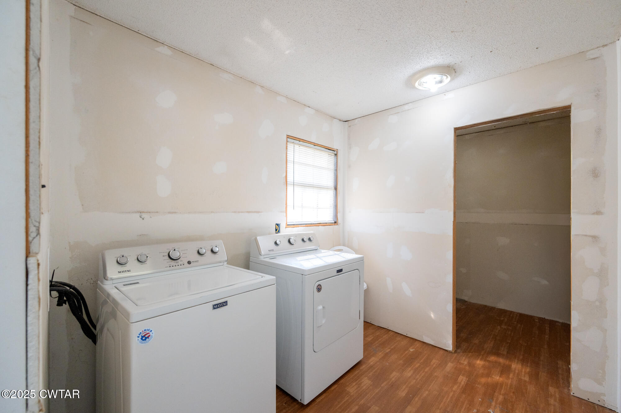 1176 Myracle Town Road Darden, TN 38328 - Photo 25 of 40 a utility room with dryer and washer