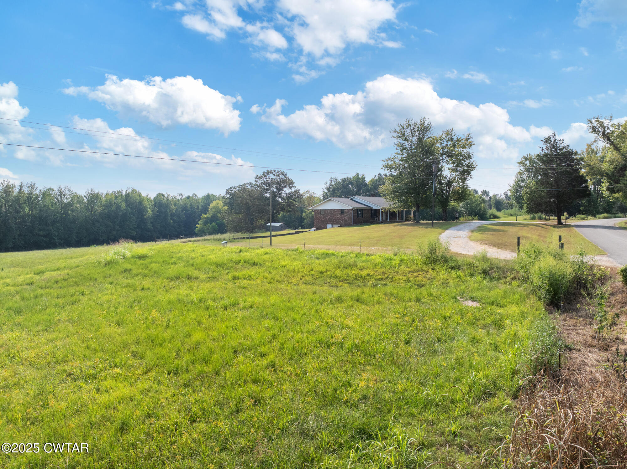 1176 Myracle Town Road Darden, TN 38328 - Photo 37 of 40 a view of an outdoor space and a yard