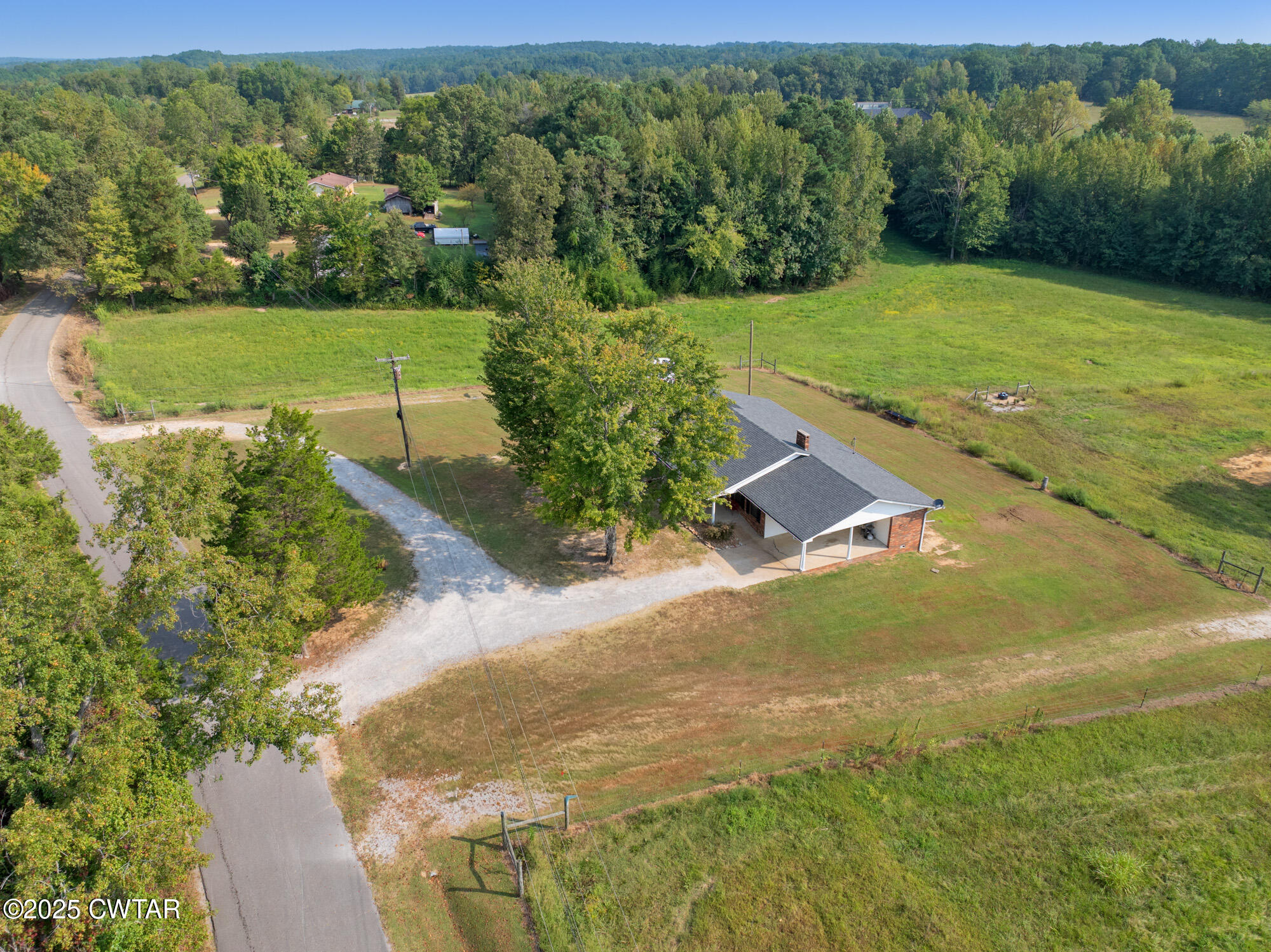 1176 Myracle Town Road Darden, TN 38328 - Photo 9 of 40 an aerial view of a garden